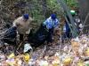 Volunteers & Boy Scouts bagging garbage